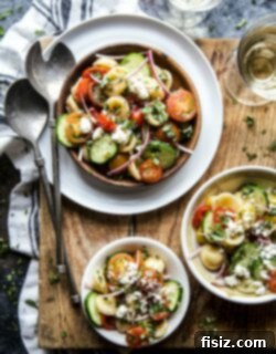Vibrant Greek Bruschetta Pasta Salad 6 A bowl of fresh Greek Bruschetta Pasta Salad ready to be served