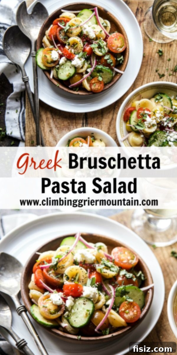 Vibrant Greek Bruschetta Pasta Salad 7 Overhead shot of Greek Bruschetta Pasta Salad in a large serving bowl with serving spoons, ready for a gathering