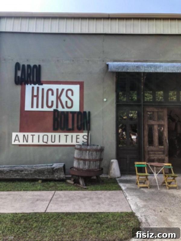 Fredericksburg Texas Explore Stay Dine 38 Storefront displaying cowboy boots and Western wear in Fredericksburg
