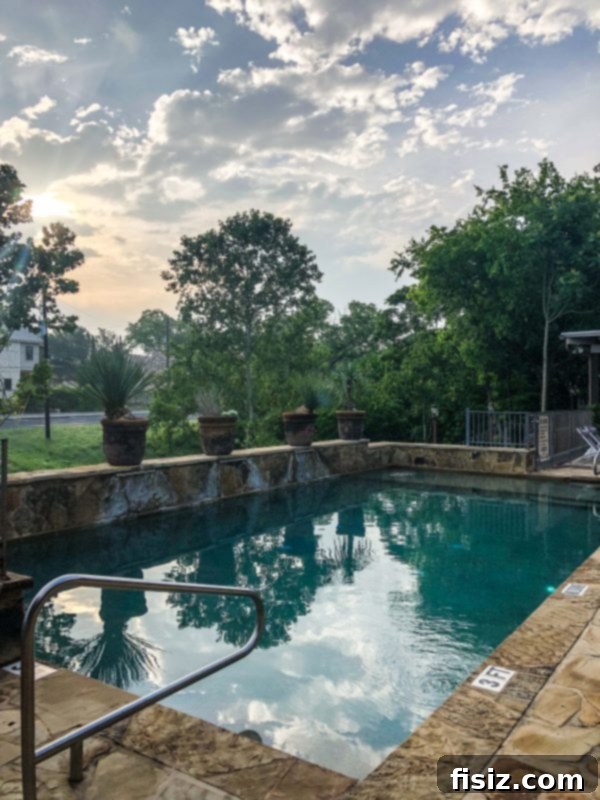 Fredericksburg Texas Explore Stay Dine 6 Cozy outdoor balcony at The Lodge Above Town Creek overlooking the pool