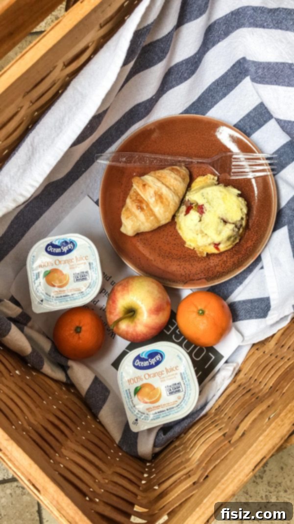 Fredericksburg Texas Explore Stay Dine 7 Delicious breakfast basket with eggs, croissant, fruit, and orange juice
