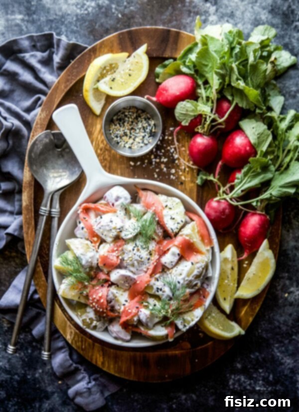 Lox and Everything Potato Salad 2 Creamy Everything Spiced Potato Salad with Lox, garnished with fresh dill.
