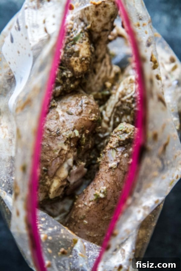 Spicy Jerk Chicken with Coconut Rice and Peas 4 Ingredients for a homemade jerk marinade laid out on a cutting board.