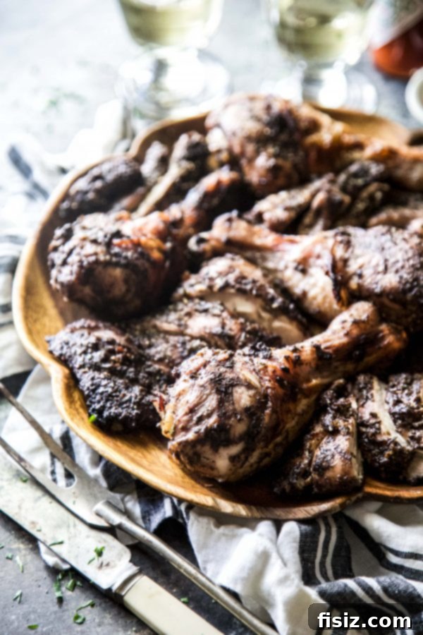 Spicy Jerk Chicken with Coconut Rice and Peas 5 Raw chicken drumsticks and thighs covered in a rich jerk marinade.