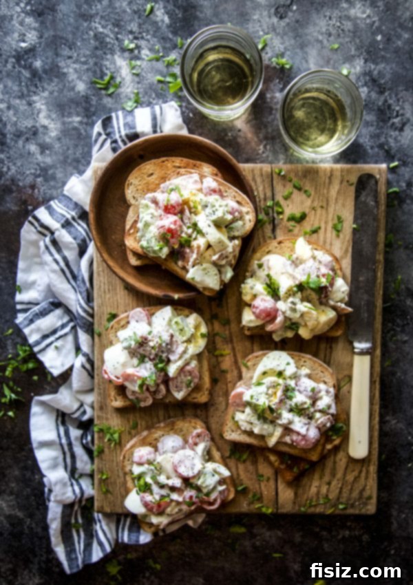 Ultimate Cobb Egg Salad Toasts 6 Cobb Egg Salad Toasts served on a plate, ready to eat.