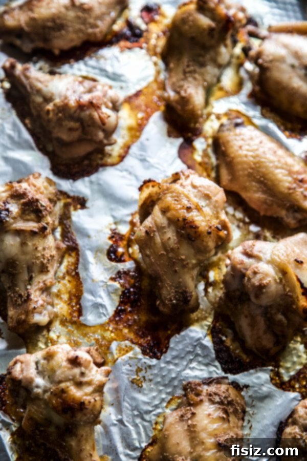 Pinoy Style Baked Chicken Wings 4 Various Filipino-Style Baked Chicken Wings laid out on a serving platter