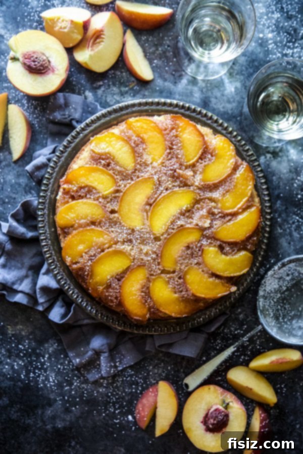 Golden Peach Upside Down Delight 5 Serving slice of Peach Upside-Down Cake with whipped cream