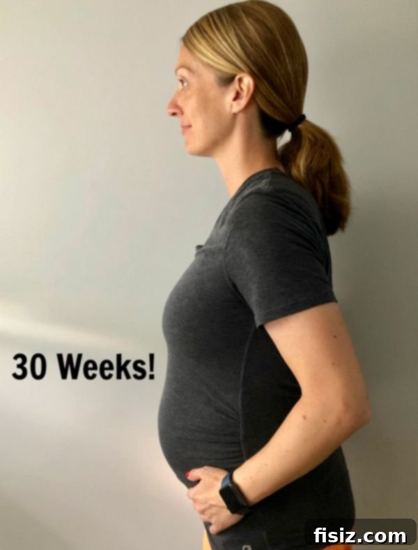 Third Trimester Milestones: Weeks 28-32 12 Expecting mother with a healthy pregnancy update at her 30-week prenatal appointment, getting ready for travel.