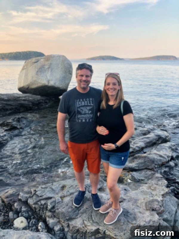 Third Trimester Milestones: Weeks 28-32 16 Couple enjoying a babymoon sunset cruise in Bar Harbor, cherishing peaceful moments together before baby arrives.