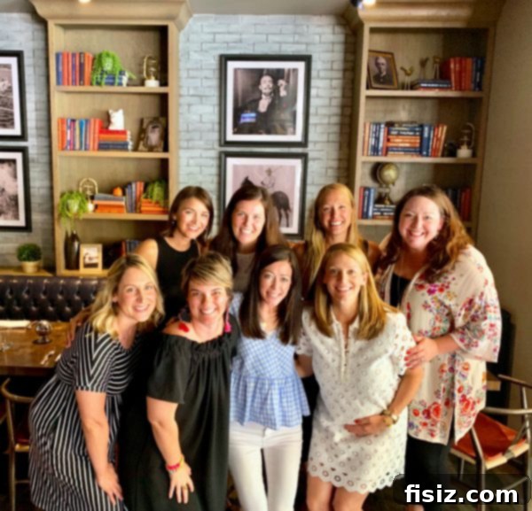 Third Trimester Milestones: Weeks 28-32 9 Group of sorority sisters celebrating at a baby shower, enjoying brunch and sharing motherhood wisdom.