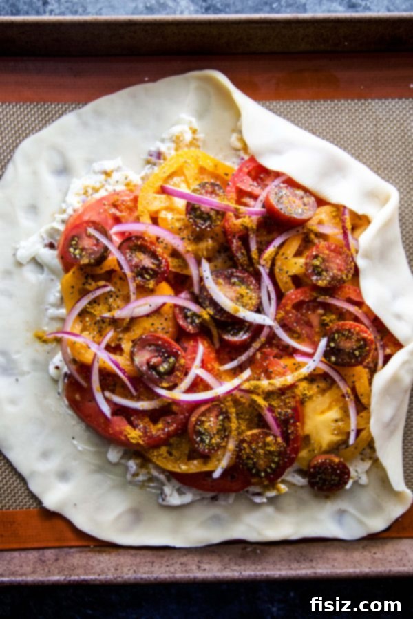 Savory Curried Tomato Tart 5 A whole Roasted Curry Tomato Galette cooling on a wire rack after baking
