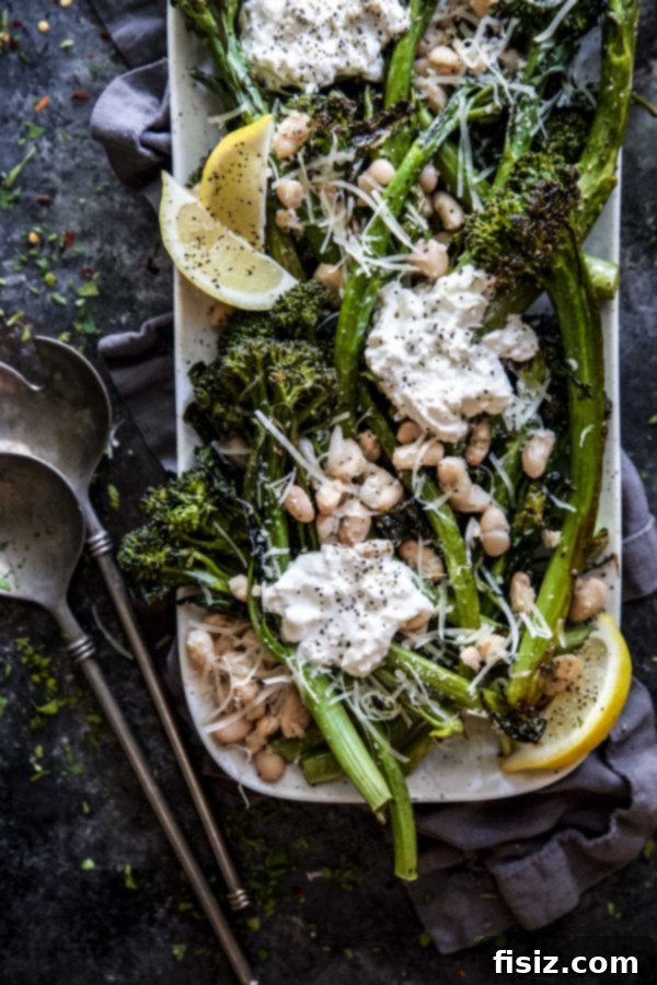 Burrata-Topped Cacio e Pepe Broccolini 3 Close-up of a pregnant woman's belly, hinting at the joy and anticipation of Baby G