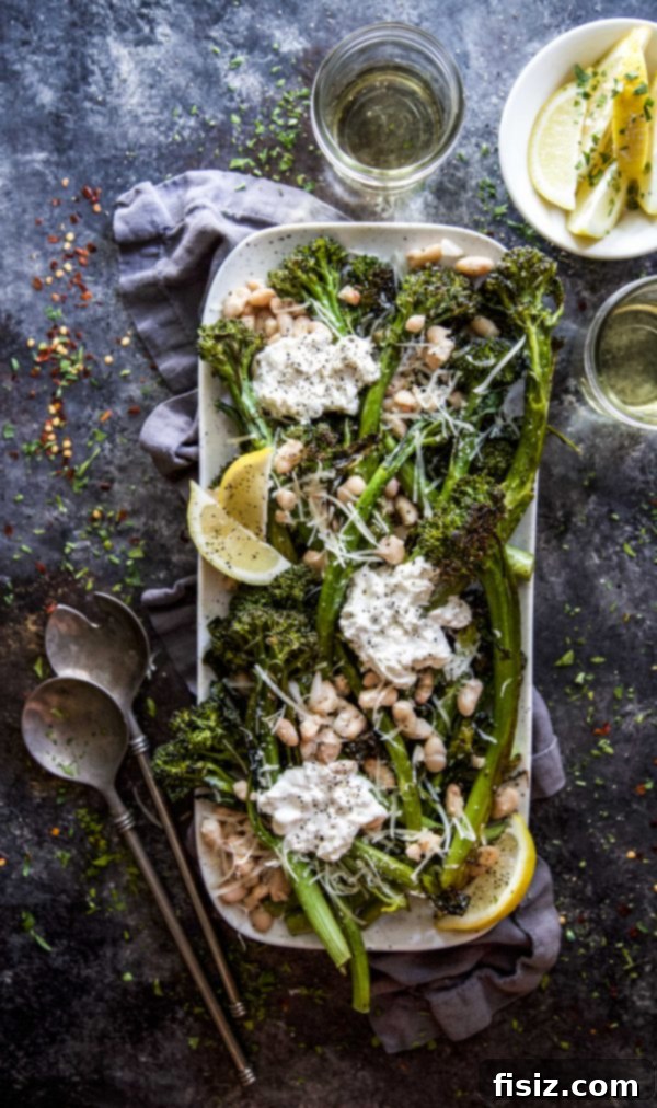 Burrata-Topped Cacio e Pepe Broccolini 6 A vibrant bowl of Cacio e Pepe Broccolini with Burrata, inviting to be enjoyed