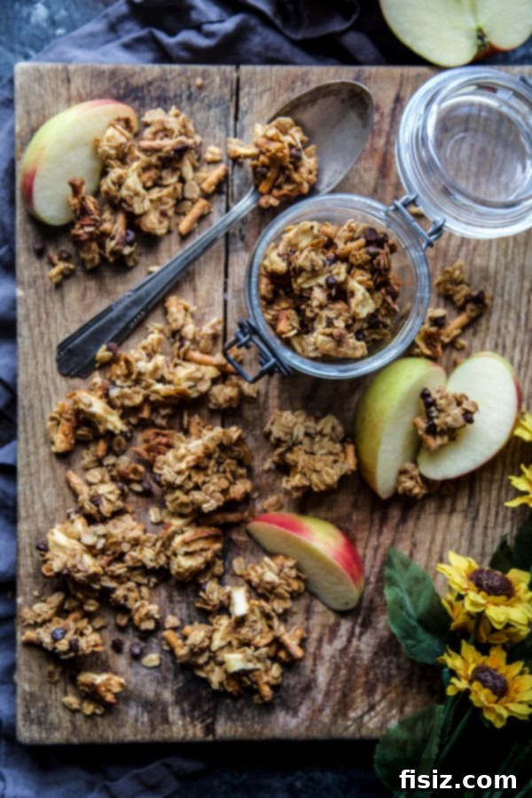 Decadent Chocolate Peanut Butter Apple Granola 5 A baking dish filled with freshly baked Chunky Chocolate Peanut Butter Apple Granola, still warm