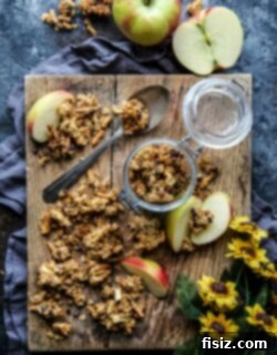 Decadent Chocolate Peanut Butter Apple Granola 6 Finished Chunky Chocolate Peanut Butter Apple Granola in a bowl, with clear clusters