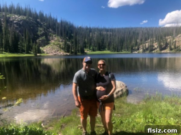 The Home Stretch: Weeks 33-37 3 Pregnant woman enjoying a scenic mountain view in Steamboat Springs, highlighting active pregnancy.