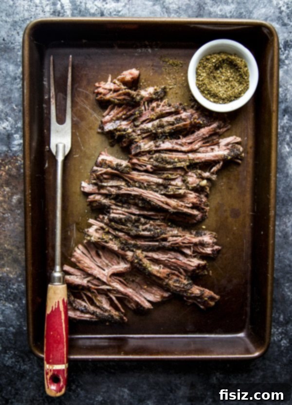 Za'atar-Spiced Slow-Cooked Steak Lettuce Wraps 4 Close-up of shredded Za'atar steak, ready for lettuce wraps