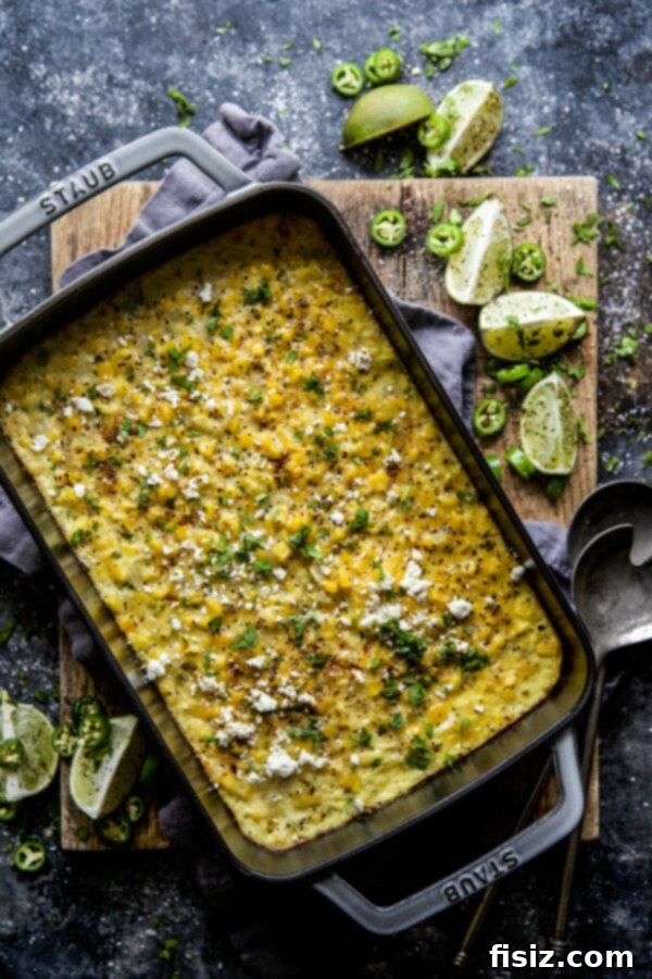 Mexican Street Corn Pudding 2 Delicious Elote Corn Pudding, garnished with fresh cilantro and chili powder
