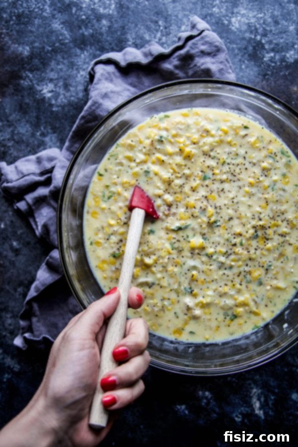 Mexican Street Corn Pudding 4 Overhead view of Elote Corn Pudding, ready to be served