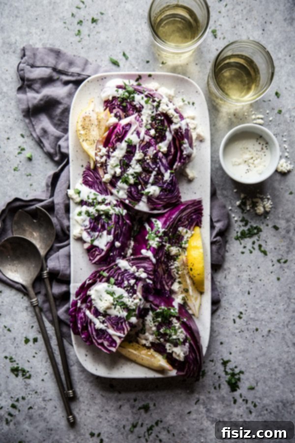 Vibrant Grilled Purple Wedge Salad 5 Overhead shot of the Grilled Purple Wedge Salad, beautifully arranged on a serving platter with all garnishes