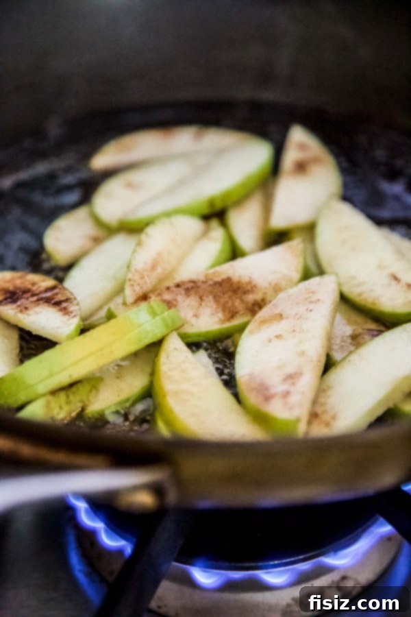 Sweet and Salty Apple Chocolate Skillet Delight 4 Slice of Salted Chocolate Chip Apple Skillet Cookie.