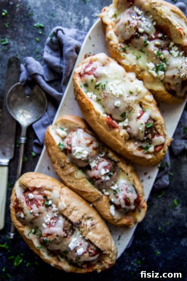 Aromatic Turkish Meatball Subs 6 Delicious Turkish Spiced Meatball Subs, topped with melted mozzarella, ready to be enjoyed