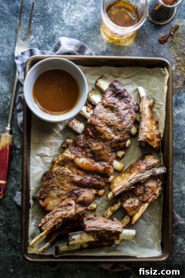 Bourbon Glazed American Lamb Ribs 3 Perfectly grilled American Lamb Ribs coated in bourbon BBQ sauce