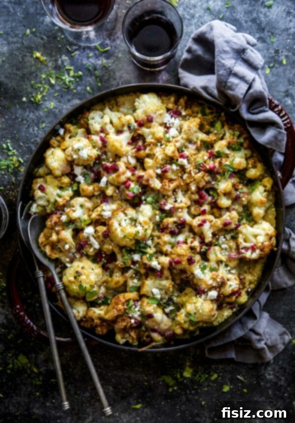 Moroccan Spiced Cauliflower Bake 2 Moroccan Cauliflower Bake garnished with fresh herbs and pomegranate arils