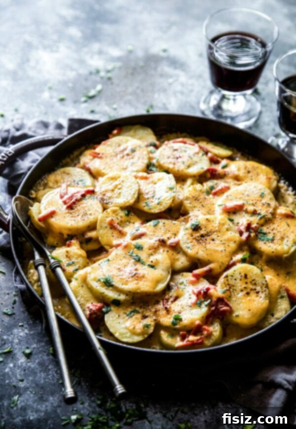 Close-up of golden brown Chipotle Pimento Cheese Au Gratin Potatoes