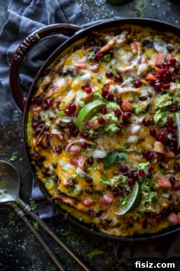 Fiesta Turkey Tamale Pie 3 Close-up of Leftover Turkey Tamale Pie, ready to be served, with vibrant toppings.