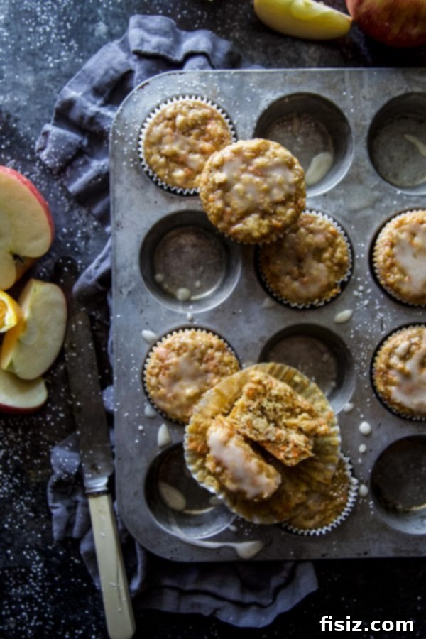 Bright Carrot Apple Muffins with Zesty Citrus Glaze 2 Delicious Carrot Apple Muffins with Bright Citrus Glaze, ready for breakfast