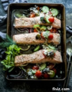 Final plated Greek Baked Salmon with side dish