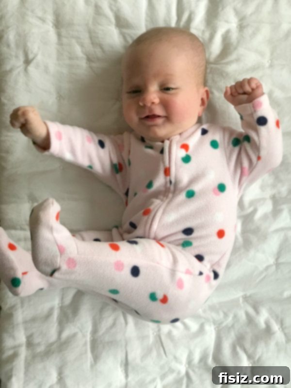 Three Months With Charlie 4 Adorable baby Charlie smiling during tummy time, showcasing her growing strength