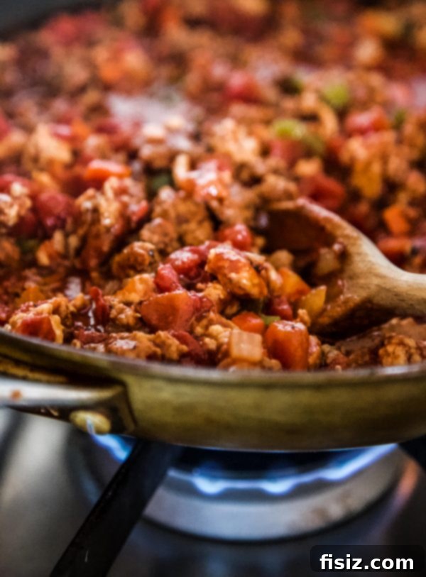 Messy Bolognese Buns 4 Bolognese Sloppy Joes simmering in a skillet