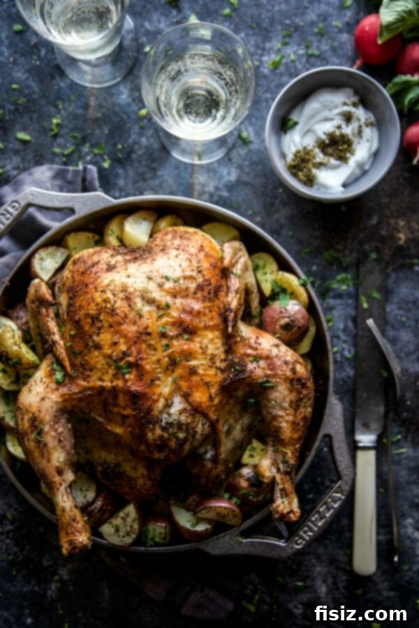 Mediterranean Za'atar Chicken and Potatoes with Spiced Labneh 2 Perfectly roasted Za'atar chicken with golden potatoes, ready to be served