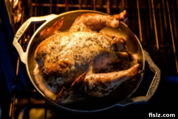 Mediterranean Za'atar Chicken and Potatoes with Spiced Labneh 5 Fresh ingredients for Za'atar Roasted Chicken and Potatoes laid out on a kitchen counter, including a whole chicken, potatoes, and a bowl of za'atar seasoning