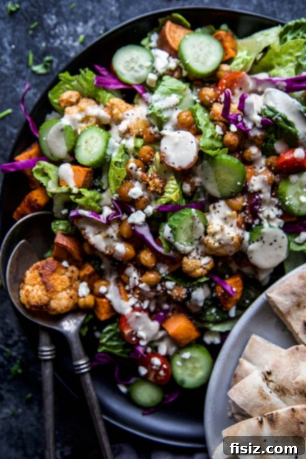 Vibrant Roasted Veggie Shawarma Bowls 3 A vibrant collection of shawarma spices laid out on a wooden board, ready for seasoning vegetables.