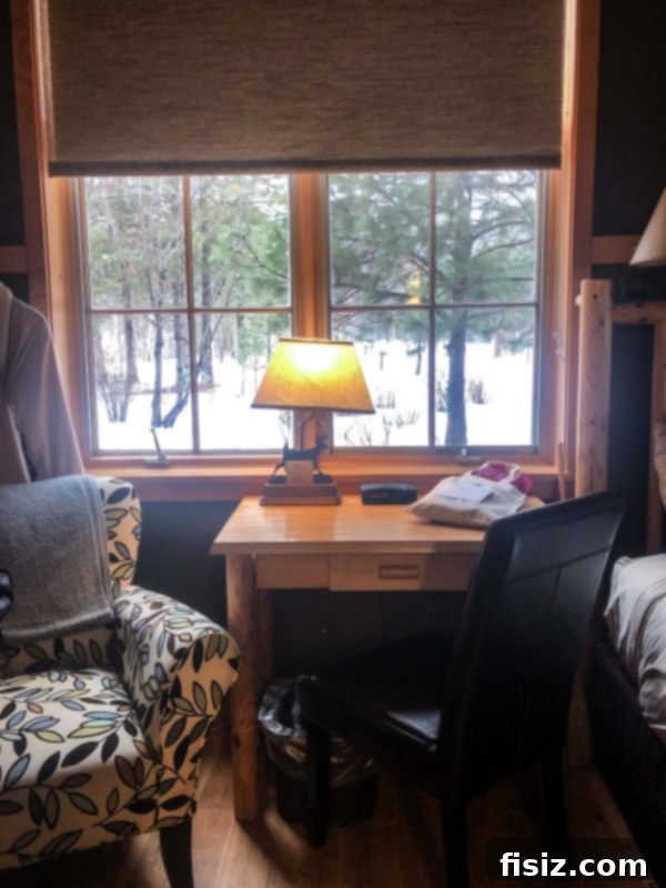 Leavenworth Washington A Bavarian Adventure Guide Stay Dine Explore 8 A queen-sized bed with rustic decor in a Sleeping Lady guest room.