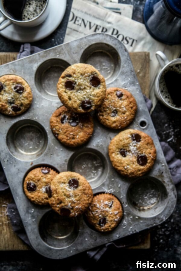 Tropical Chocolate Coconut Banana Bread Muffins 5 A perfectly baked Chocolate Coconut Banana Bread Muffin, showcasing the golden-brown top and delightful texture.