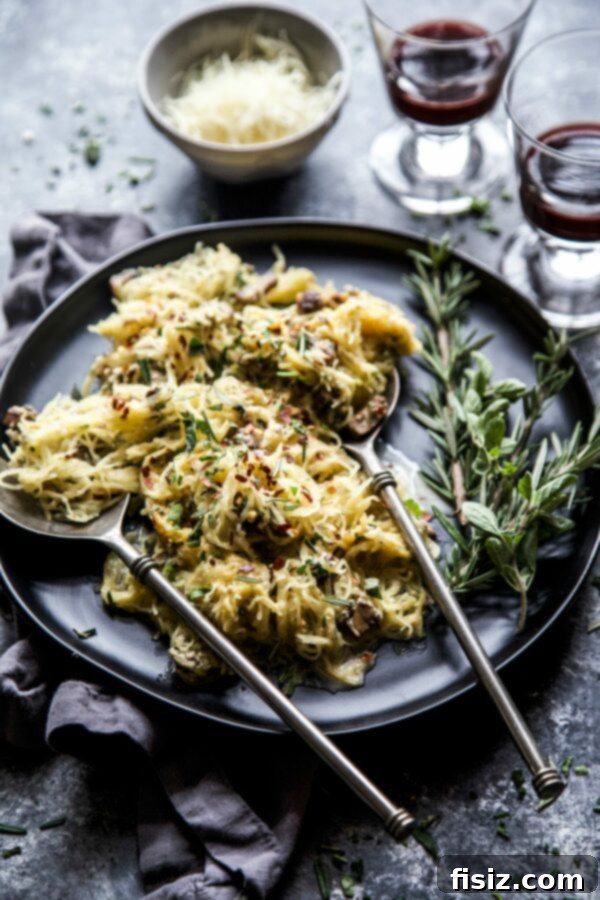 Herbed Creamy Spaghetti Squash 2 A beautifully plated dish of creamy spaghetti squash, garnished with fresh herbs.