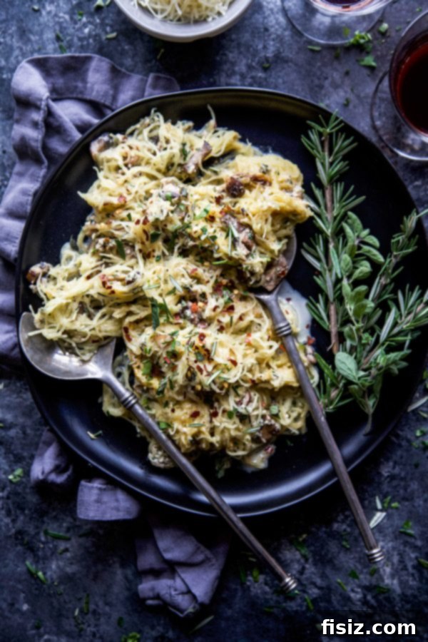 Herbed Creamy Spaghetti Squash 3 Close-up of spaghetti squash being prepared, showcasing its natural strands.
