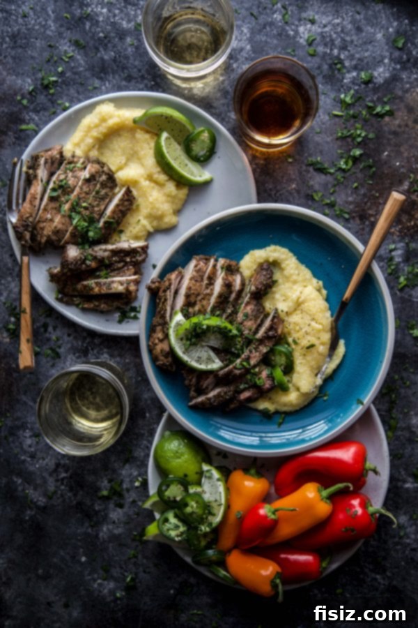 Plated Jerk Chicken Thighs with a side of Jalapeno Polenta