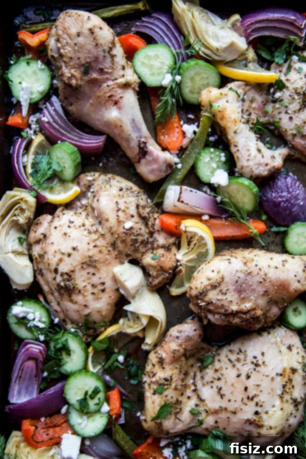 Effortless Greek Sheet Pan Chicken 5 Freshly baked Sheet Pan Chicken Souvlaki with lemon wedges