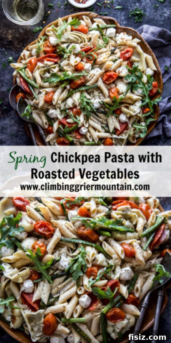 Vibrant Springtime Chickpea Pasta with Garden Vegetables 8 A large serving bowl filled with Spring Chickpea Pasta with Roasted Vegetables, ready to be enjoyed.