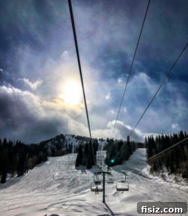 Solitude Mountain Resort: The Ultimate Family Getaway 8 Skier making fresh tracks on a pristine slope at Solitude Mountain Resort