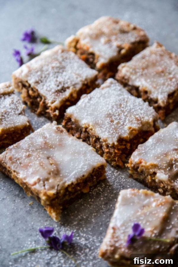 Golden Carrot Cake Blondies 3 Close-up of Carrot Cake Blondies with a rich cream cheese swirl