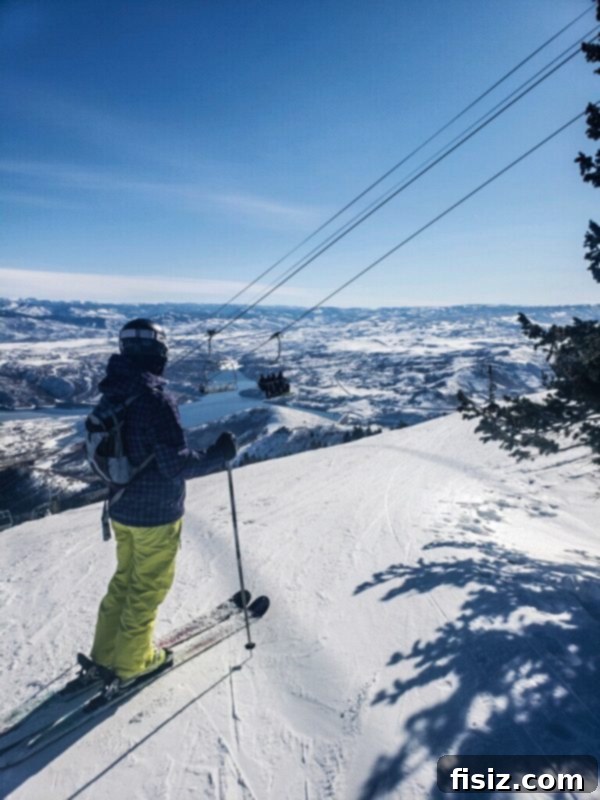 Deer Valley: The Ultimate Family Weekend 12 A couple skiing down a pristine, uncrowded slope at Deer Valley Resort