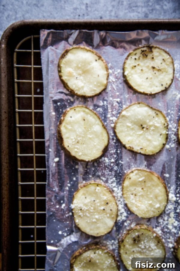 Oven-Baked Parmesan Pepper Crisps 5 Stack of golden baked potato chips ready to be served