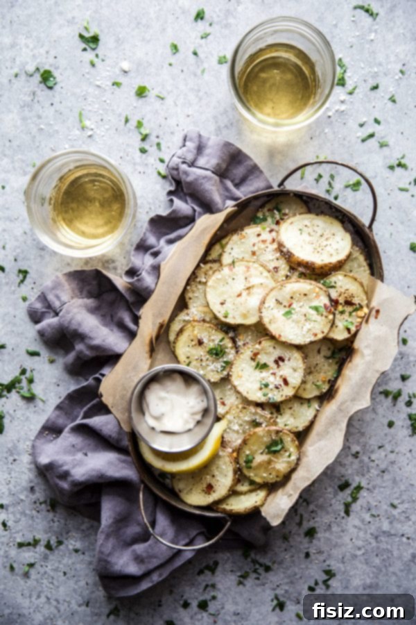 Oven-Baked Parmesan Pepper Crisps 6 Delicious Parmesan and Pepper Baked Potato Chips served with a side of lemon aioli