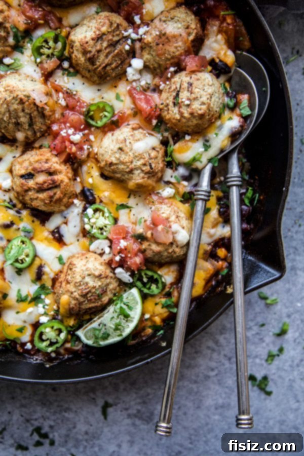Turkey Meatball Enchilada Skillet 3 Enchilada Turkey Meatball Skillet served with fresh cilantro garnish